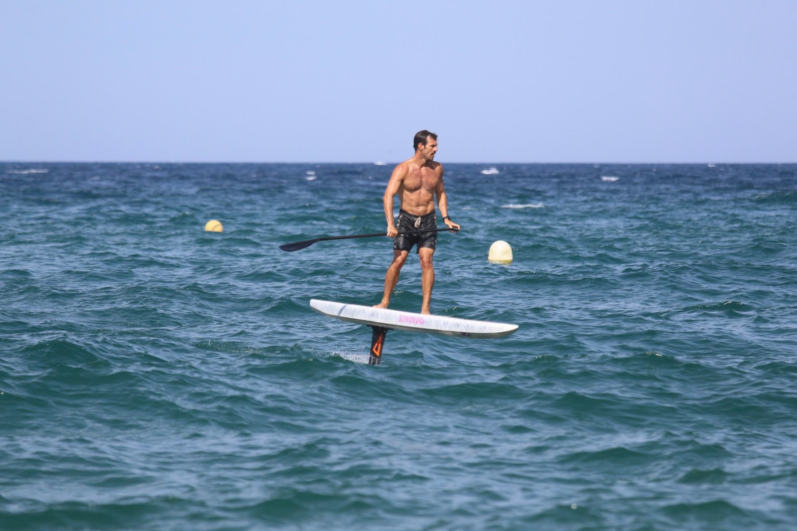 sup foil downwind lessons in pantai costa brava